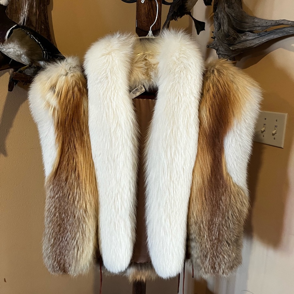 Fox Vest with leather trim.